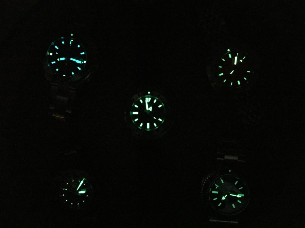Illuminated watch faces from Seiko, Tag Heuer, Doxa and Zodiac