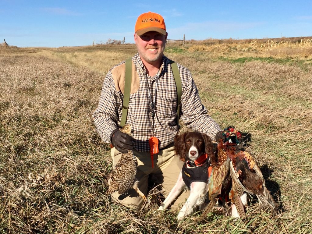 Pheasant Hunter and brittany spaniel