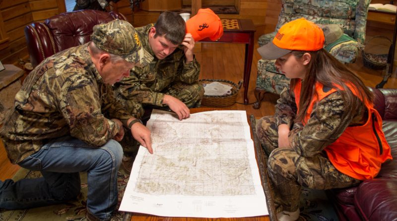 Hunters Reviewing a Map