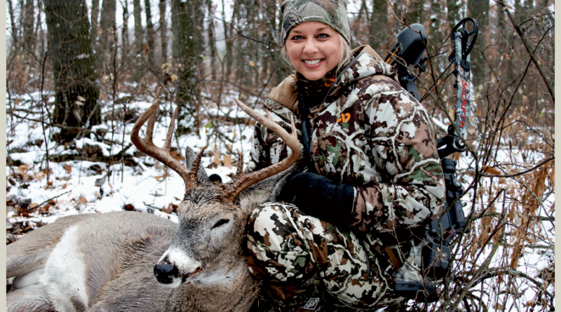 Women hunter with whitetail