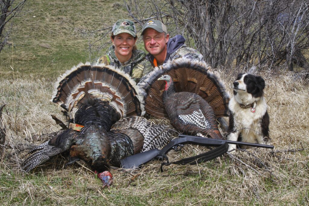 Sharon, Mark's wife, tagged this tom in the spring of 2019. Their dog Sage sat quietly behind them to watch the entire hunt, copyright Mark Kayser