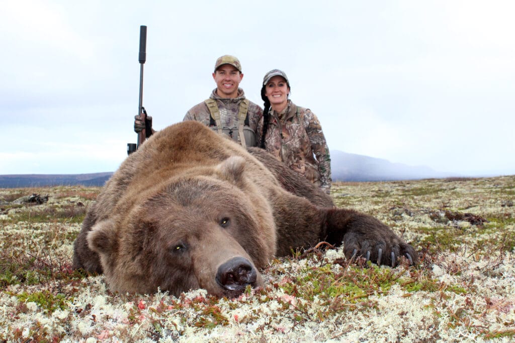 Hunters with an alaskan bear bear