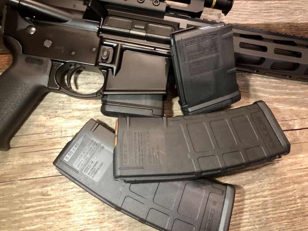 an ar-15 and magazines