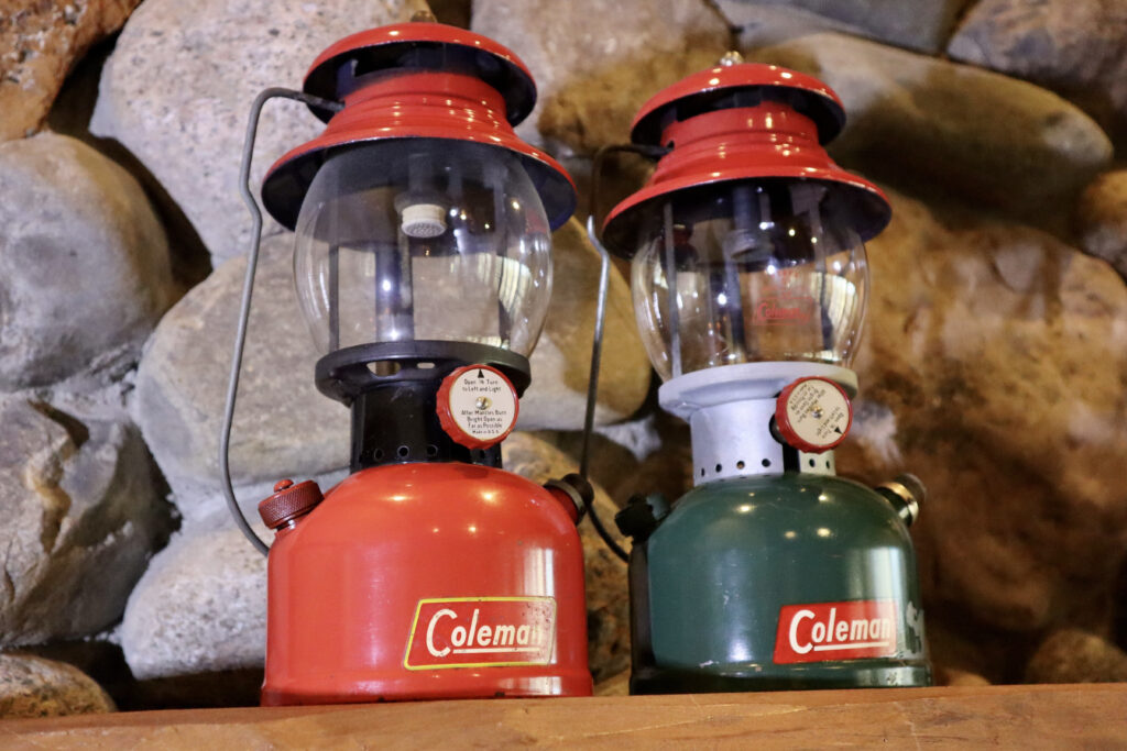 A Coleman 200A "Black Band" edition and the highly sought-after Coleman "Christmas" lantern from 1951