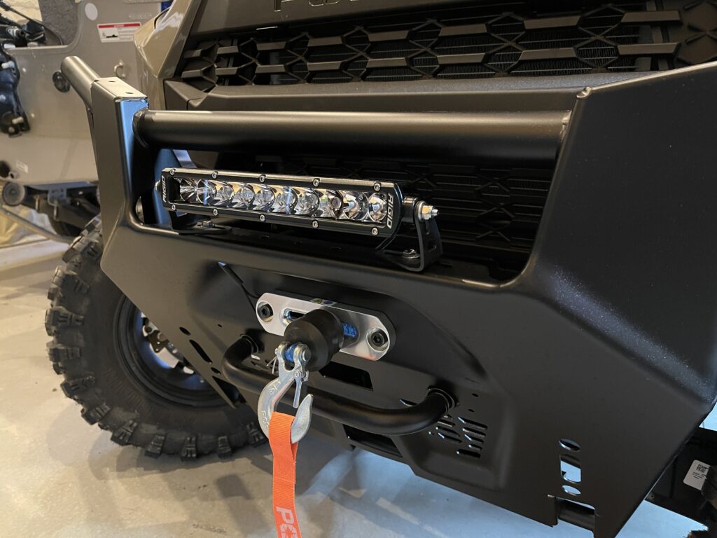 Rigid® SR-Series 10 in. Combo LED Light Bar mounted on a Polaris Ranger